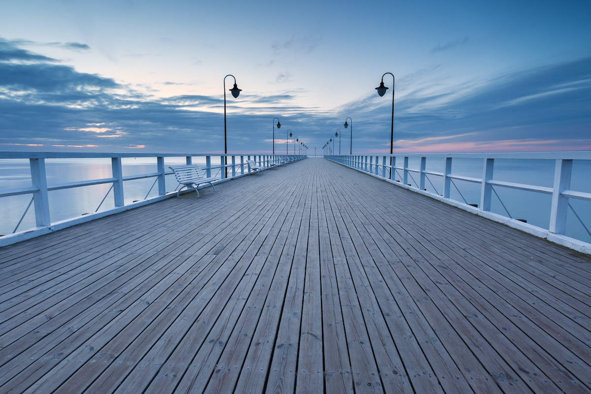Beautiful long exposure seascape with wooden pier. Pier in Orlowo, Gdynia in Poland.